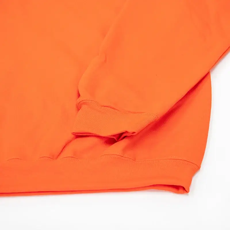 Cuff on orange sweatshirt