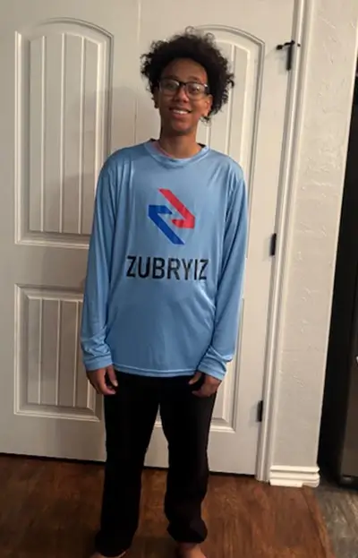 Boy wearing long sleeve Zubryiz shirt