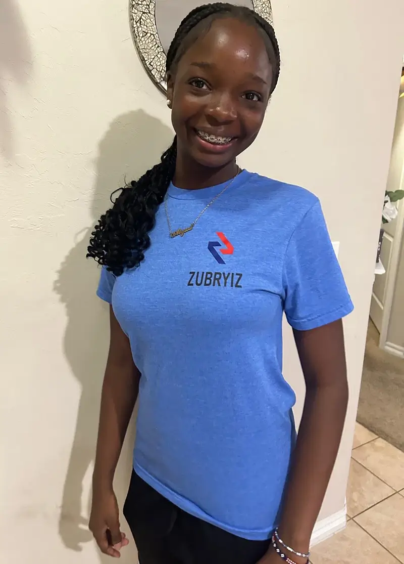 Smiling girl with blue Zubryiz shirt